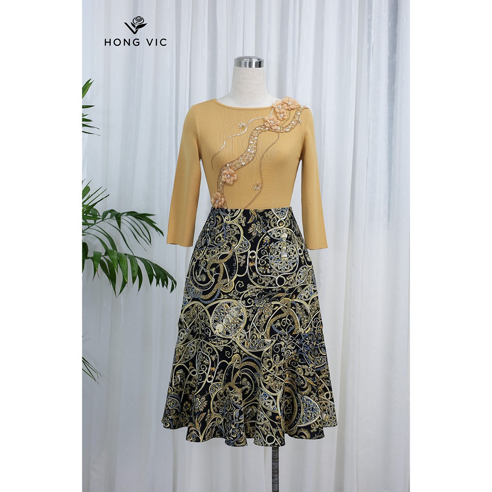 Áo nữ thiết kế Hongvic len vàng kem xẻ tà AL16