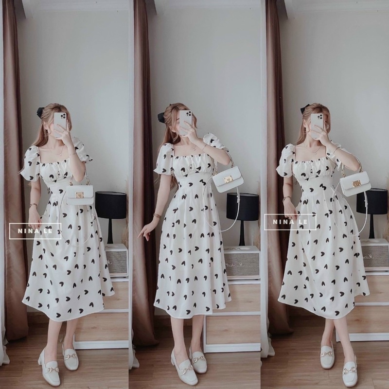 (SHOP TÁO ĐỎ BIGSIZE 50kg đến 90kg ) Đầm midi hoạ tiết trái tim cột nơ lưng tay phồng