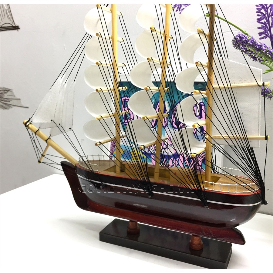 Quà tặng tân gia trang trí phong thủy Mô hình thuyền buồm gỗ trang trí nhà cửa - Dài 27cm - Buồm vải nhiều màu