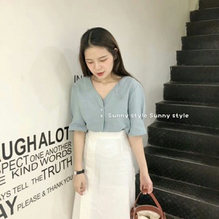 Chân váy midi xẻ bên