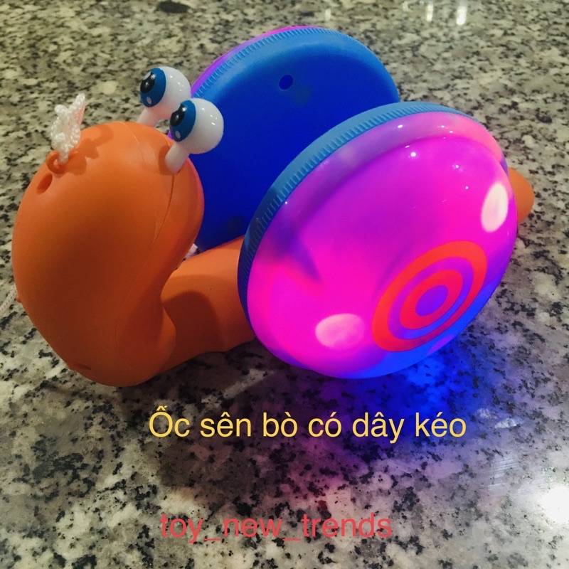 Đồ chơi trẻ em, đồ chơi cho bé, ốc sên đồ chơi. Mô hình đồ chơi ốc sên dùng dây kéo , màu sắc rõ nét
