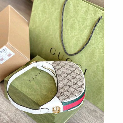 Túi Guccii kẹp nách nâu trắng hoạ tiết GC siêu hot