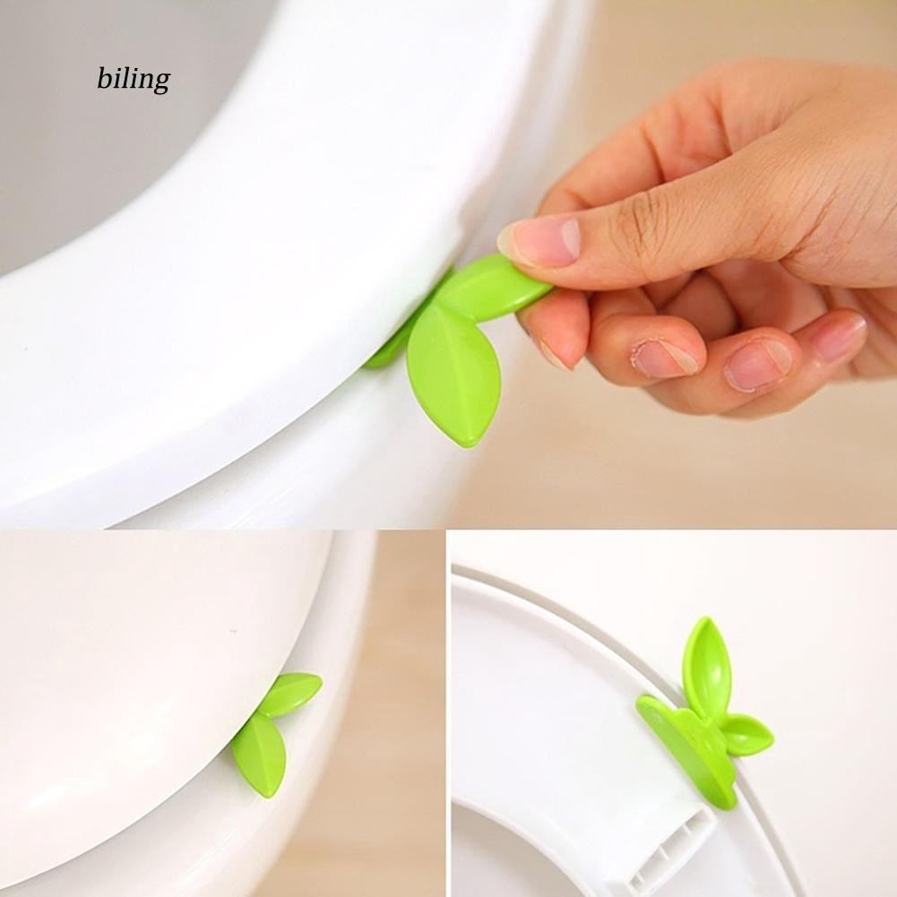 Tay cầm nhấc nắp bồn cầu hình chiếc lá sáng tạo tiện dụng trong nhà vệ sinh