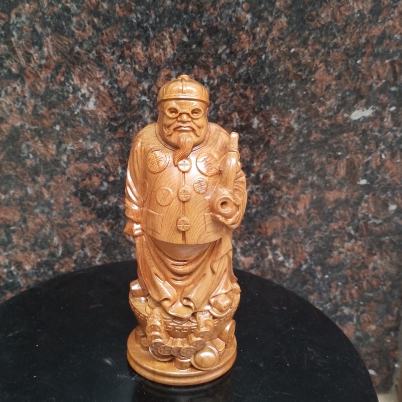 tượng ông quản gia gỗ bach xanh