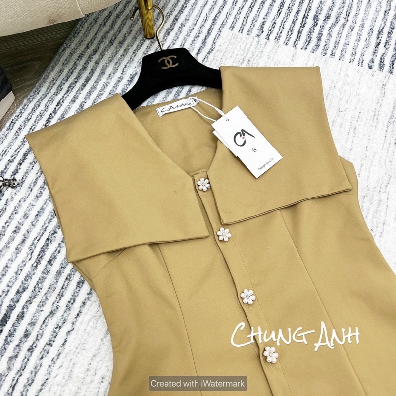 Áo sơ mi cổ vuông kaki chun khuy hoa