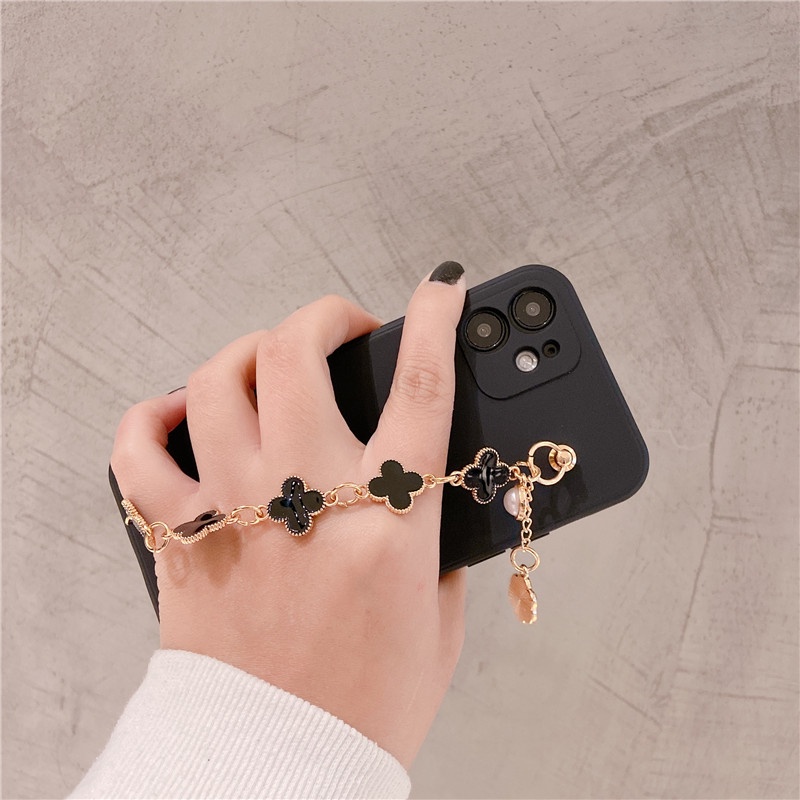Apple iPhone 5G 5S SE 6 6S 7 8 Plus X XS XR XSMAX Fashion clover wrist strap mobile phone protection shell Ins Style Bracelet mobile phone case Simple fall proof mobile phone case