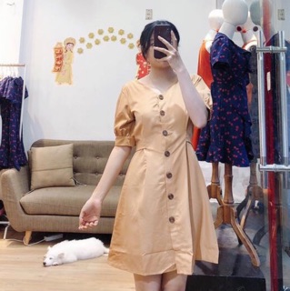 Đầm kem cột nơ sau