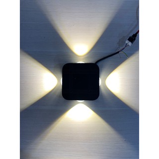 Đèn tường led 12w 4 tia vuông, Ø107xH45mm viền đen,ánh sáng vàng