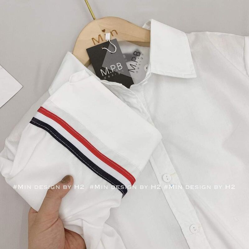 Áo sơ mi viền tay pha