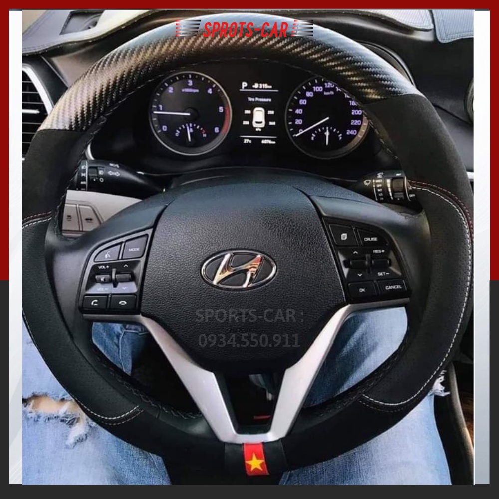 Bọc vô lăng cờ Việt Nam da vân carbon phối da lộn