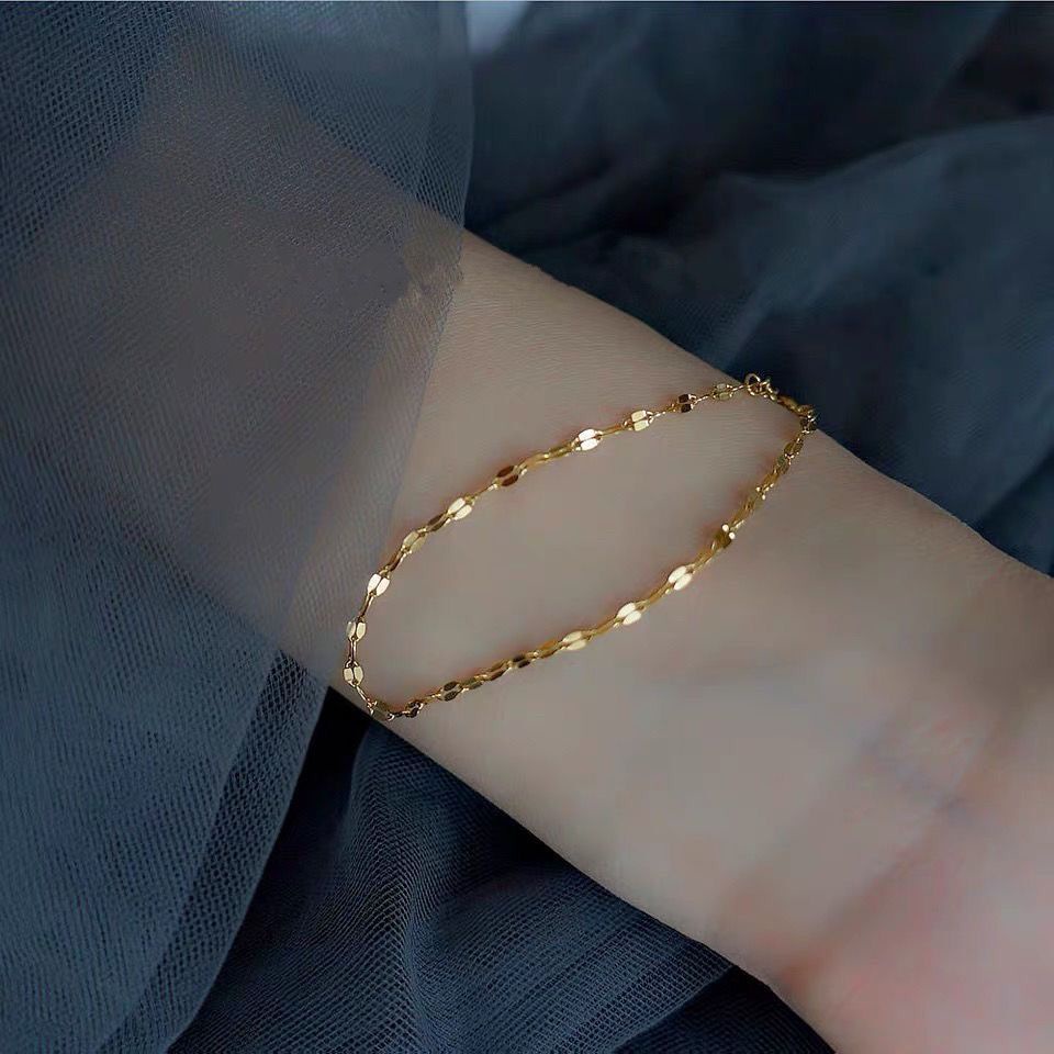 Lắc tay titan màu vàng không rỉ