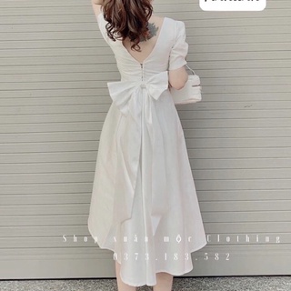 Váy trắng nữ kiểu dáng xoè dài cổ vuông nơ to hở lưng tay bồng , đầm tiểu thư