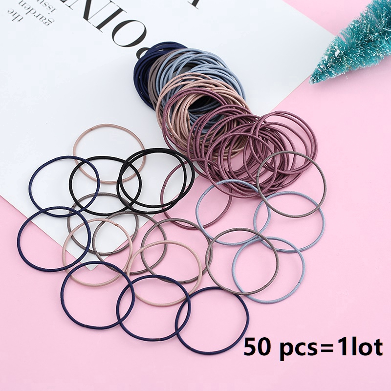 Set 50 dây buộc tóc cao su co giãn màu trơn cho nữ