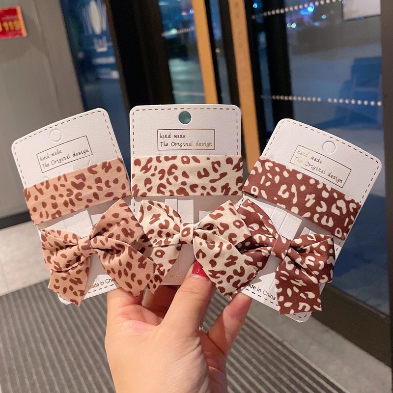 Kẹp tóc hình nơ họa tiết da báo phong cách retro dành cho nữ