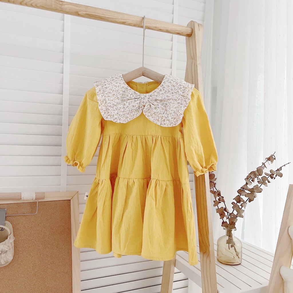 Váy thu dài tay chất thô mỏng màu trơn, cổ thắt nơ cho bé gái 1-5 tuổi