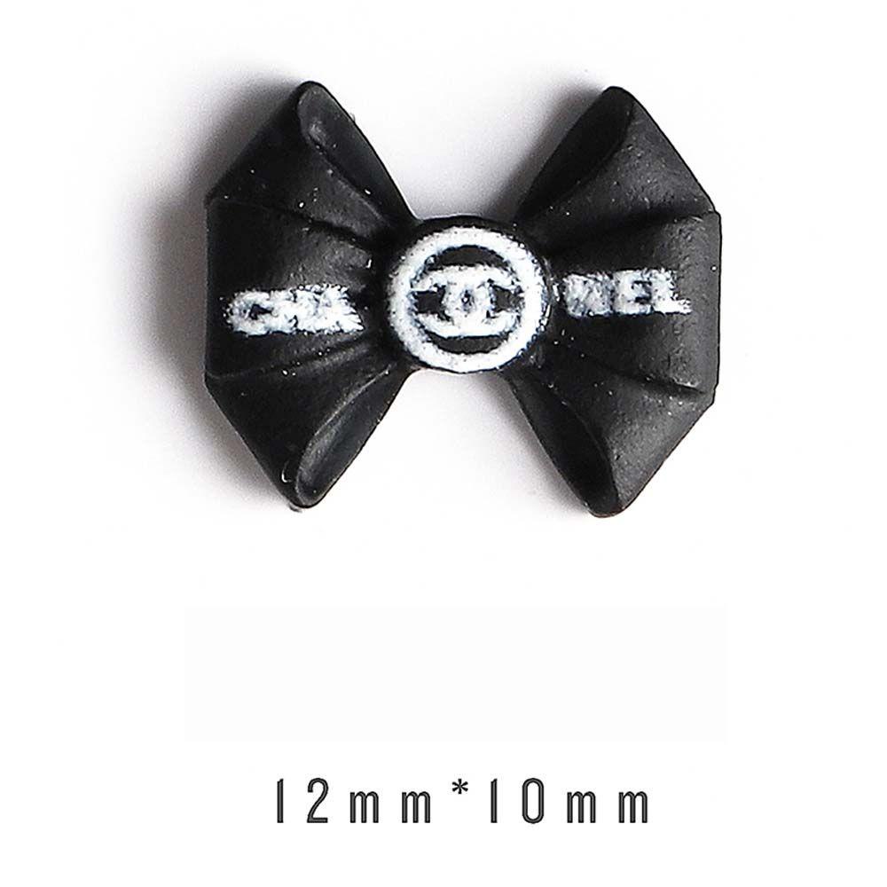 Phụ Kiện Trang Trí Móng Tay Hình Nơ 3D Bằng Nhựa Resin Màu Trắng Đen Thanh Lịch