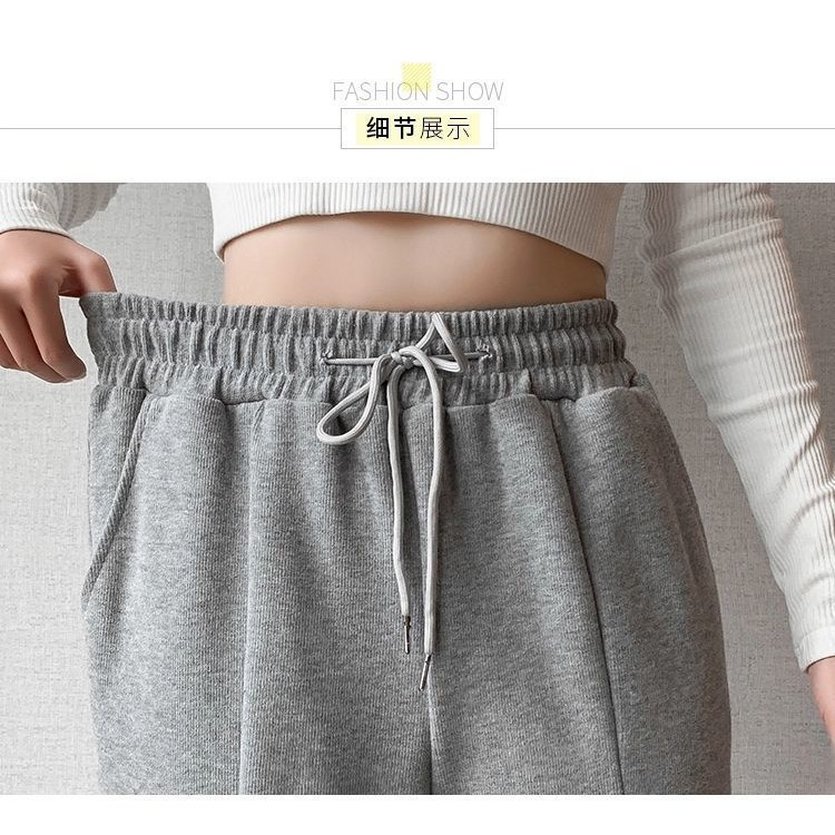 Quần dài lưng cao ống rộng thiết kế xẻ tà cá tính thời trang dành cho nữ | BigBuy360 - bigbuy360.vn