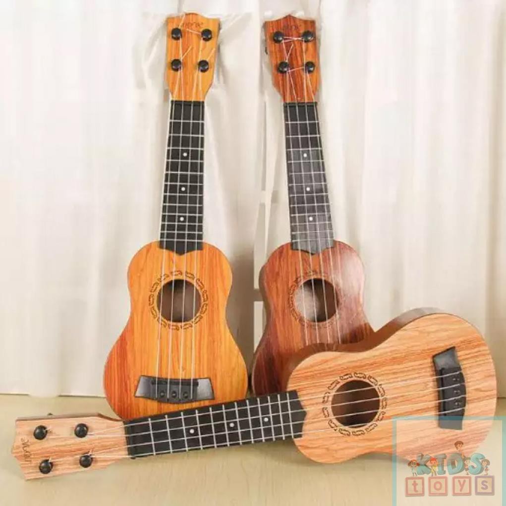 Đàn ukulele mini, đàn guitar mini cho bé tặng kèm vỏ đựng