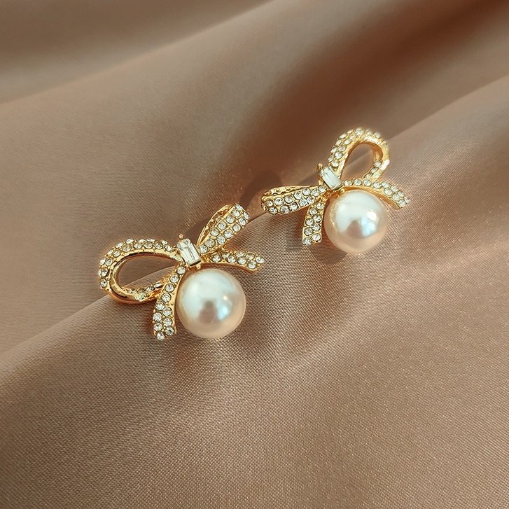 Bông tai hình nơ đính ngọc trai nhân tạo phong cách đơn giản hợp thời trang