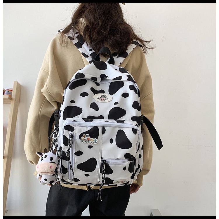 Balo đi học, balo nam nữ thời trang bò sữa chống nước kiểu dáng Hàn Quốc thời trang 2021