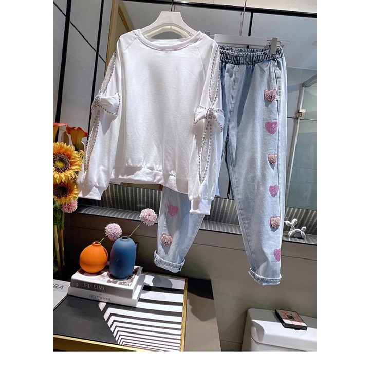European 2022 spring new heavy industry nail bead love hole water washing light blue loose waist covering meat all kinds of daddy trousers