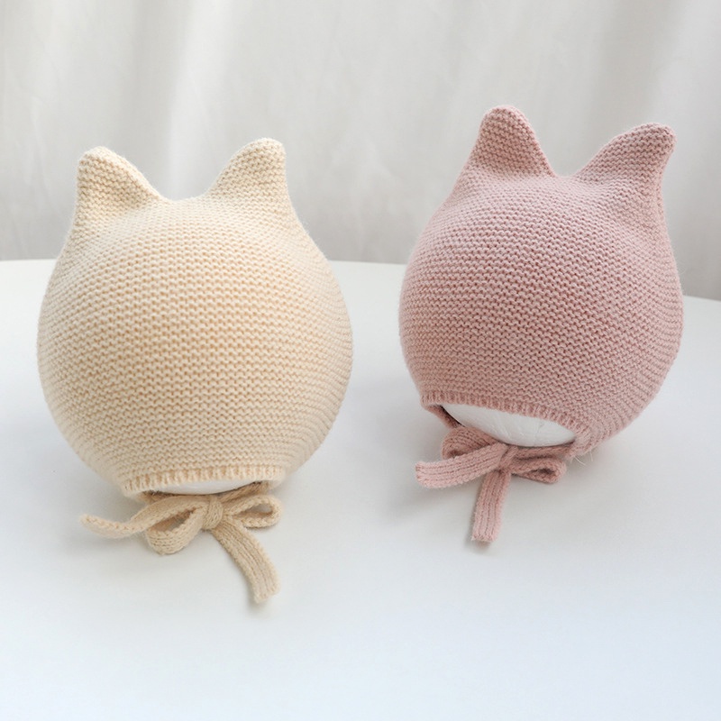 Mũ beanie dệt kim màu trơn có tai dễ thương giữ ấm chống gió mùa thu đông cho bé