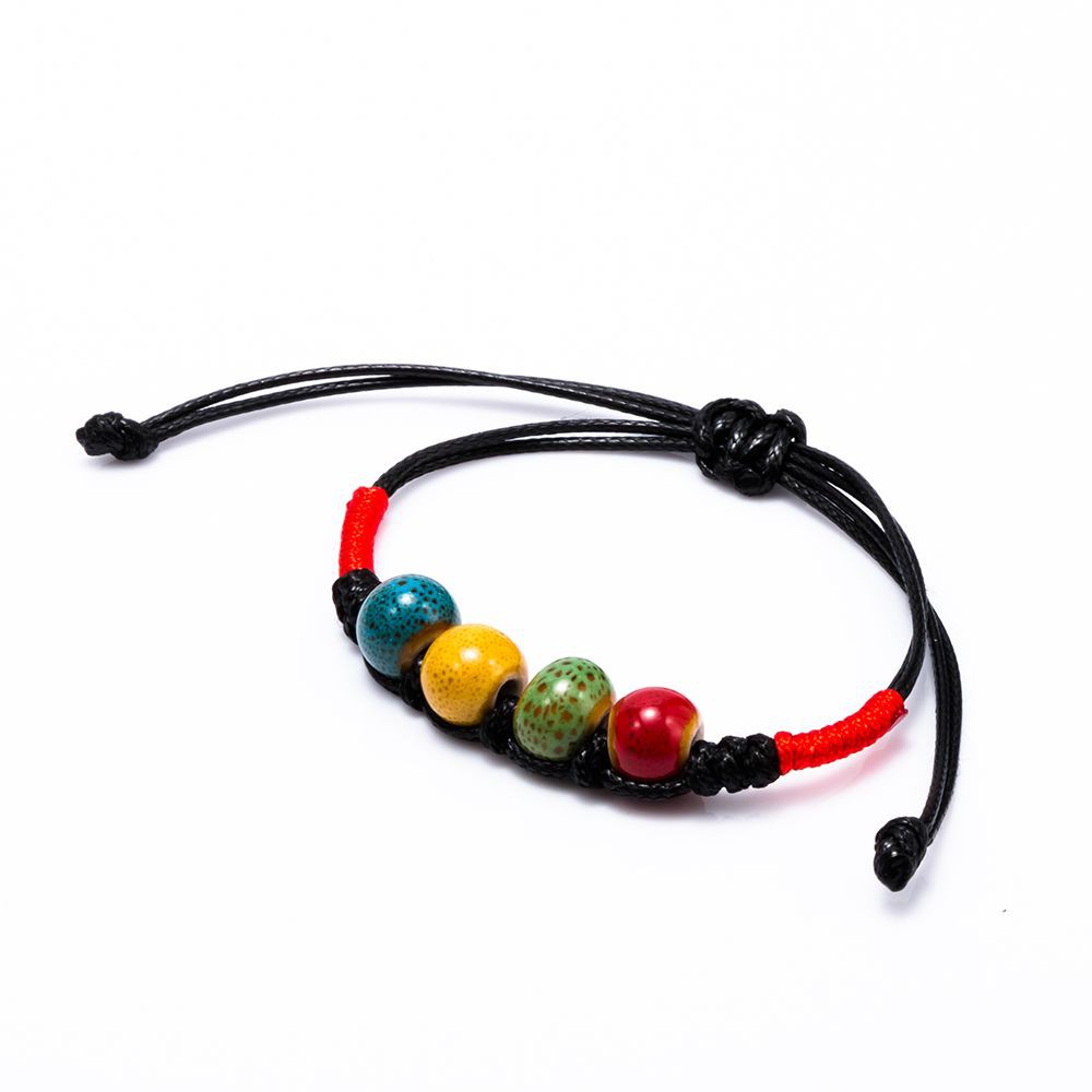 Vòng Đeo Tay Kết Hạt Sứ Hình Chiếc Lá Cho Nam Và Nữ