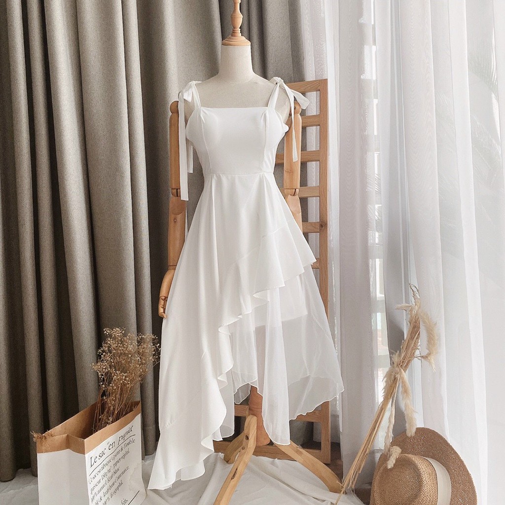 Đầm váy nữ màu trắng dáng xòe 2 dây dễ thương cột nơ vai lệch tà cá tính thời trang XUKA-DRESS MT004 thiết kế đẹp