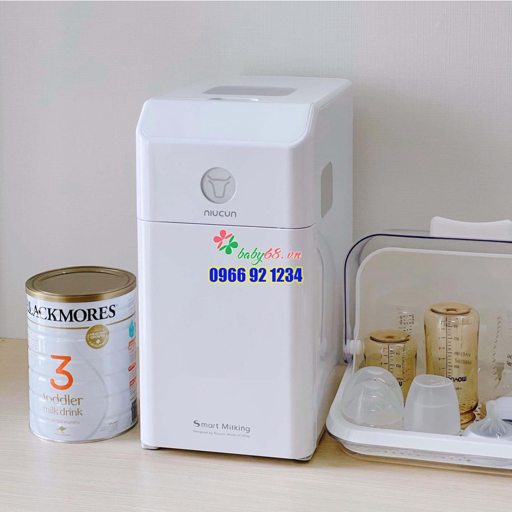 Máy pha sữa Niucun có tiệt trùng UV thông minh, sấy khô, pha được tất cả các loai sữa từ 35-70 độ