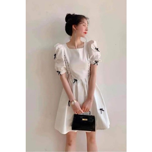 Đầm trắng đính nơ vải dày dặn cao cấp
