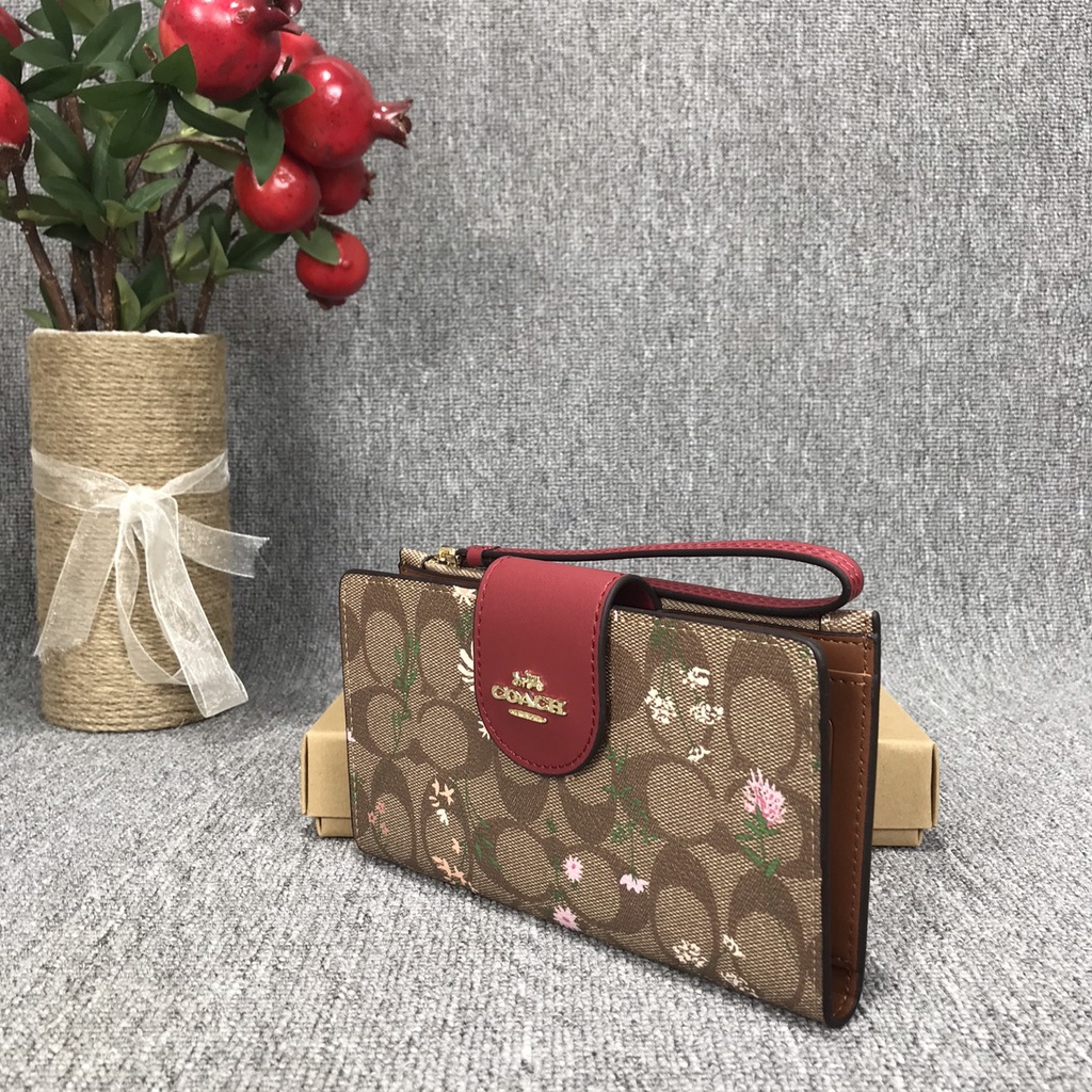 Ví clutch nữ cầm tay Coach có dây đeo cổ tay hàng xuất dư xịn có ngăn đựng điện thoại