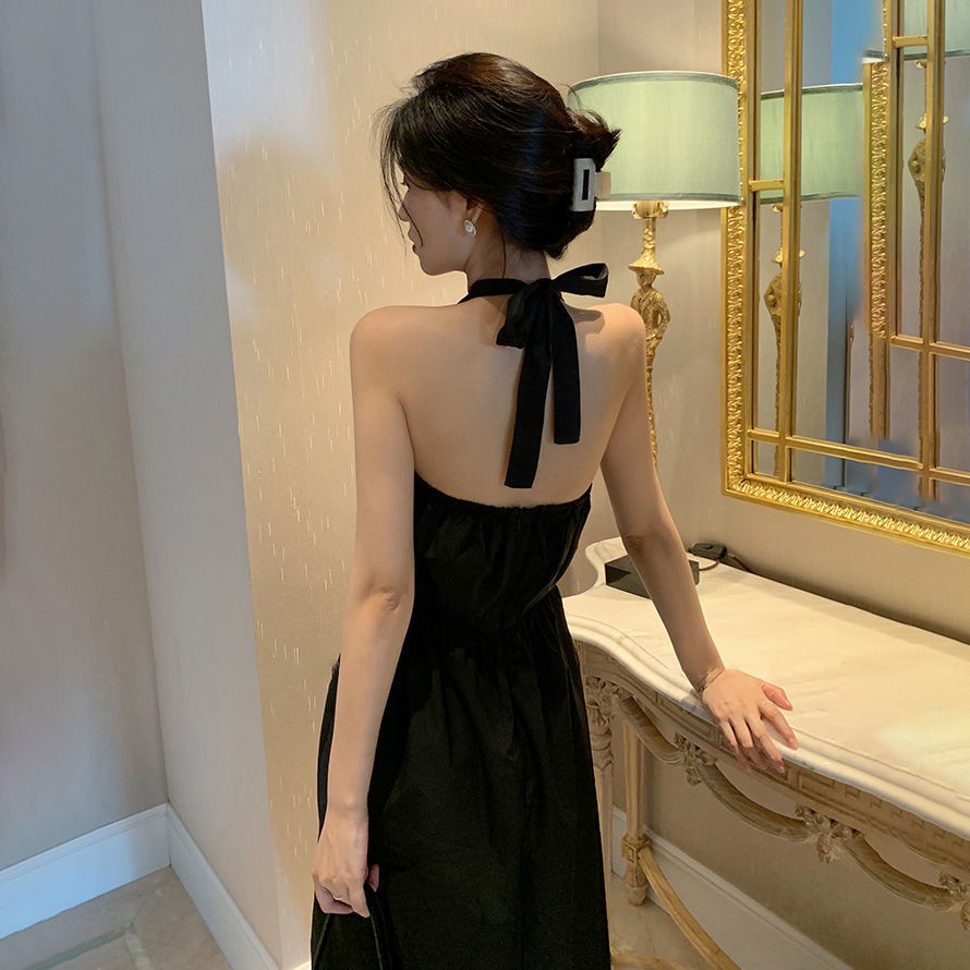 Váy đen phối dây treo không tay nữ ngọt ngào tính khí nhẹ nhàng sang trọng