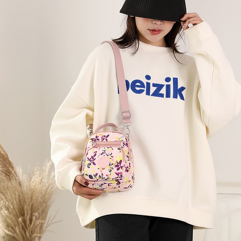 Túi Đeo Chéo Sợi Nylon Họa Tiết Hoa Phong Cách Mới Cho Nữ