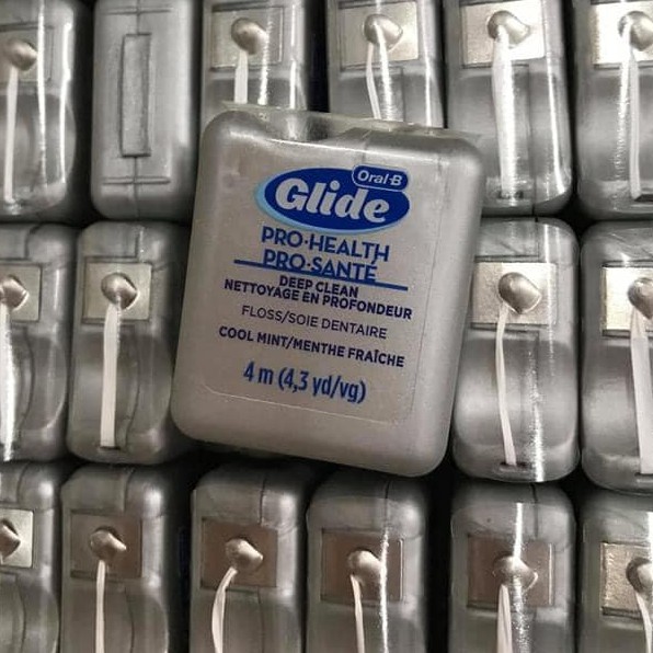 - Chỉ nha khoa Oral B