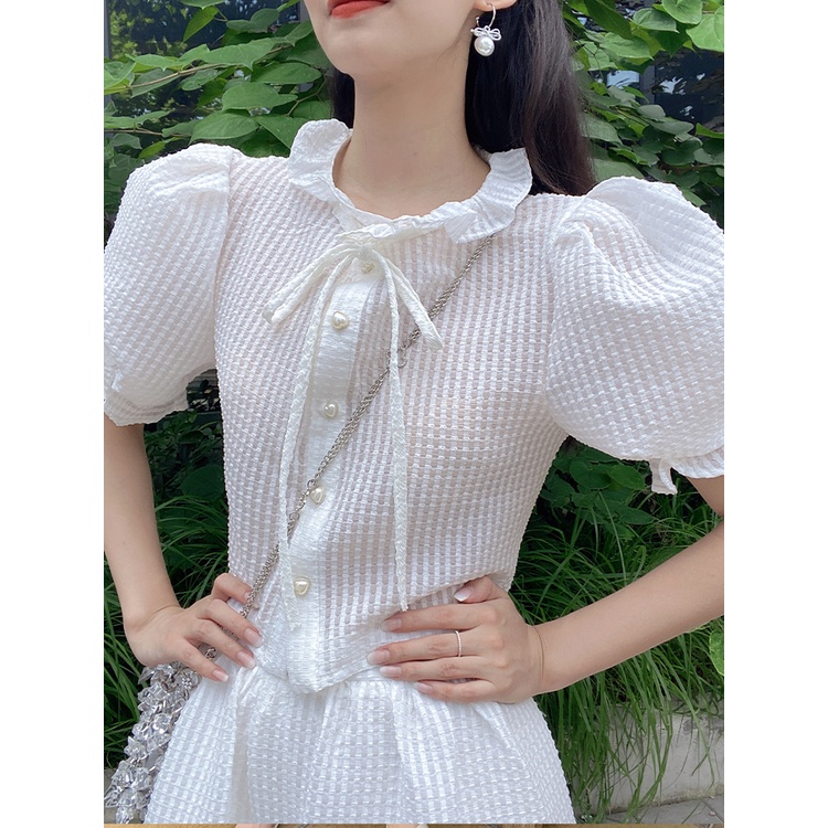 Jane Áo sơ mi croptop tiểu thư tay nhí - chân váy sold out