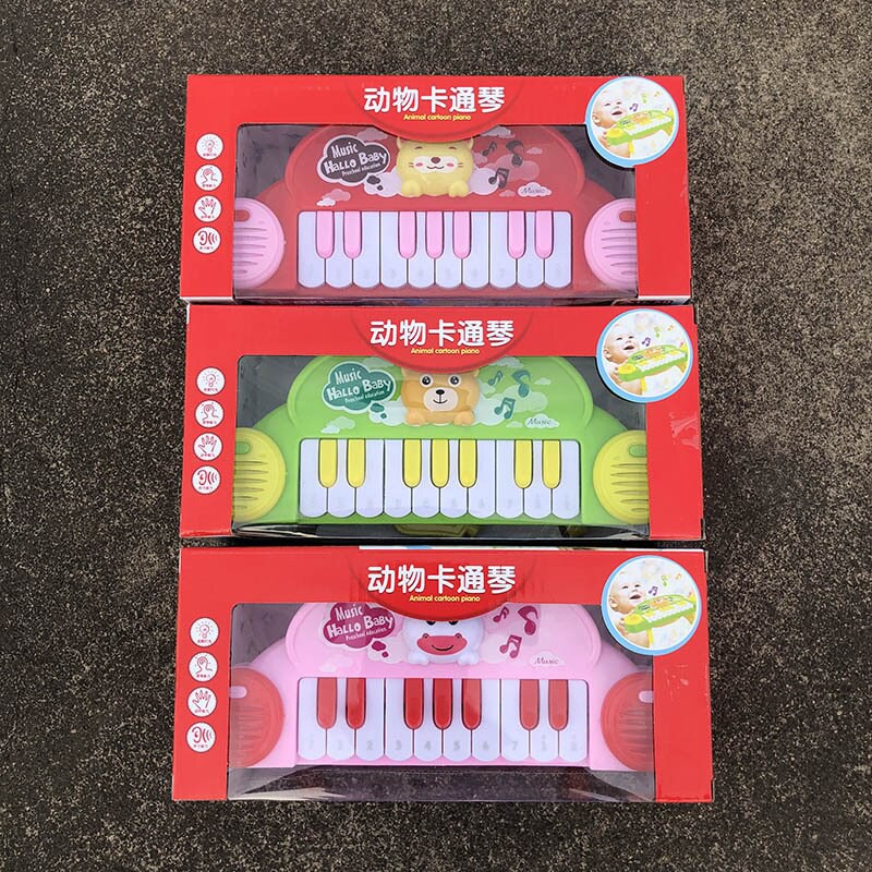 Combo 1 đàn piano cho bé + 1 sư tử chạy dây cót