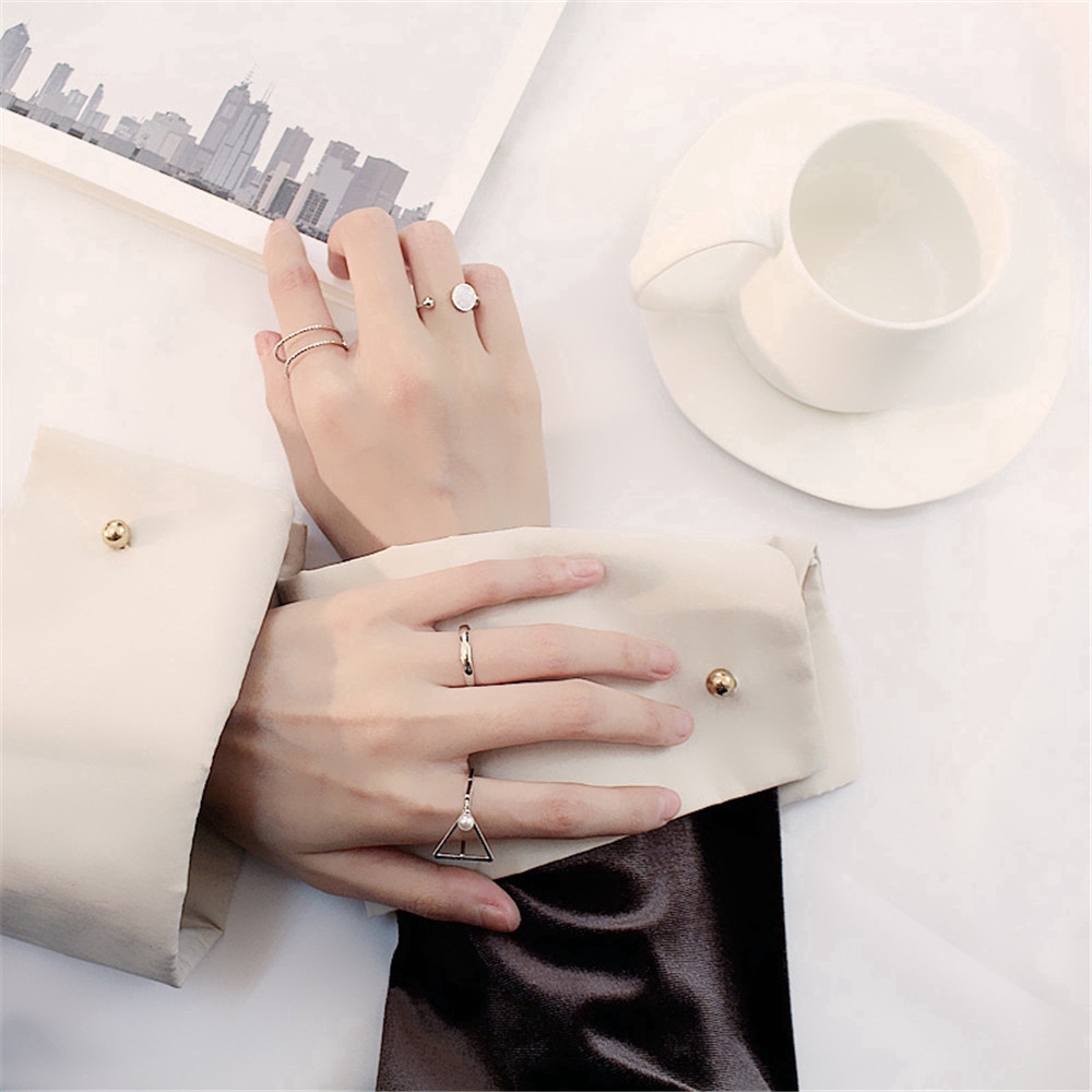 Bộ 4 nhẫn bằng hợp kim đính hạt ngọc trai thiết kế đơn giản thời trang thanh lịch cho nữ