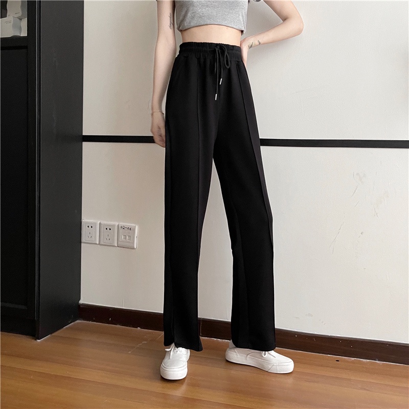 Quần dài dáng rộng lưng cao với thiết kế xẻ tà phối dây rút thời trang cá tính