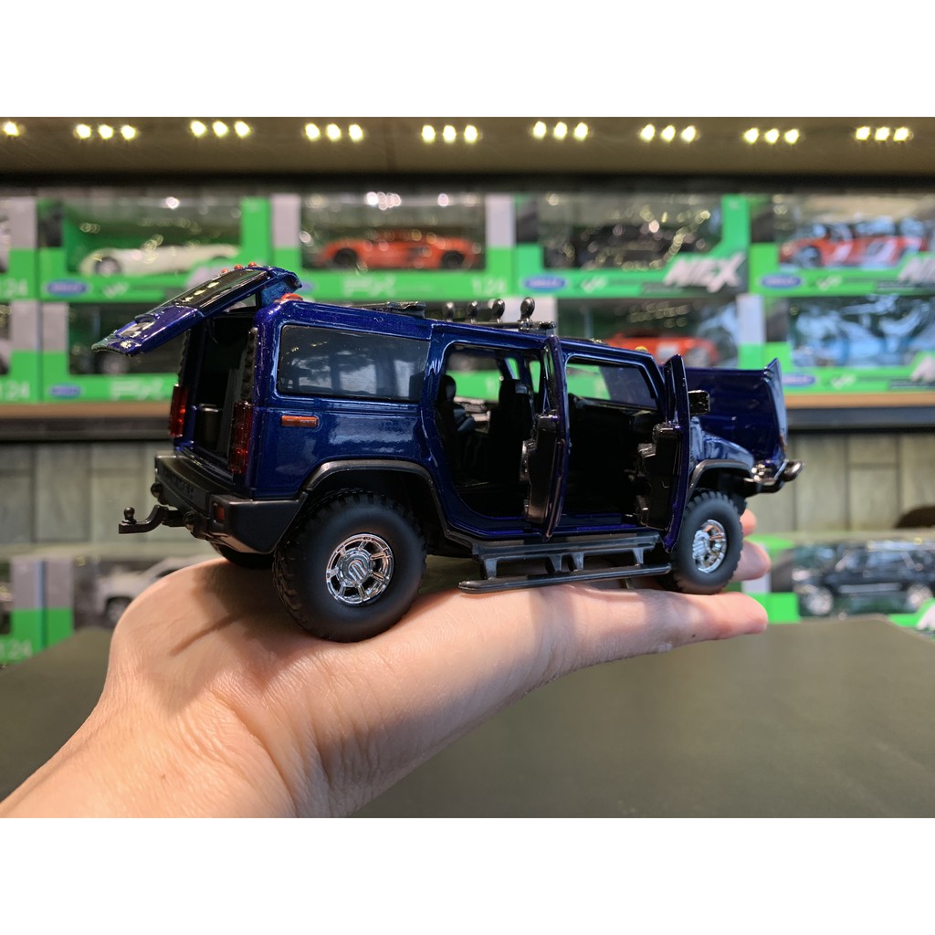 Mô hình xe Hummer H2 tỉ lệ 1:32 của hãng Jackiekim (4 Màu )