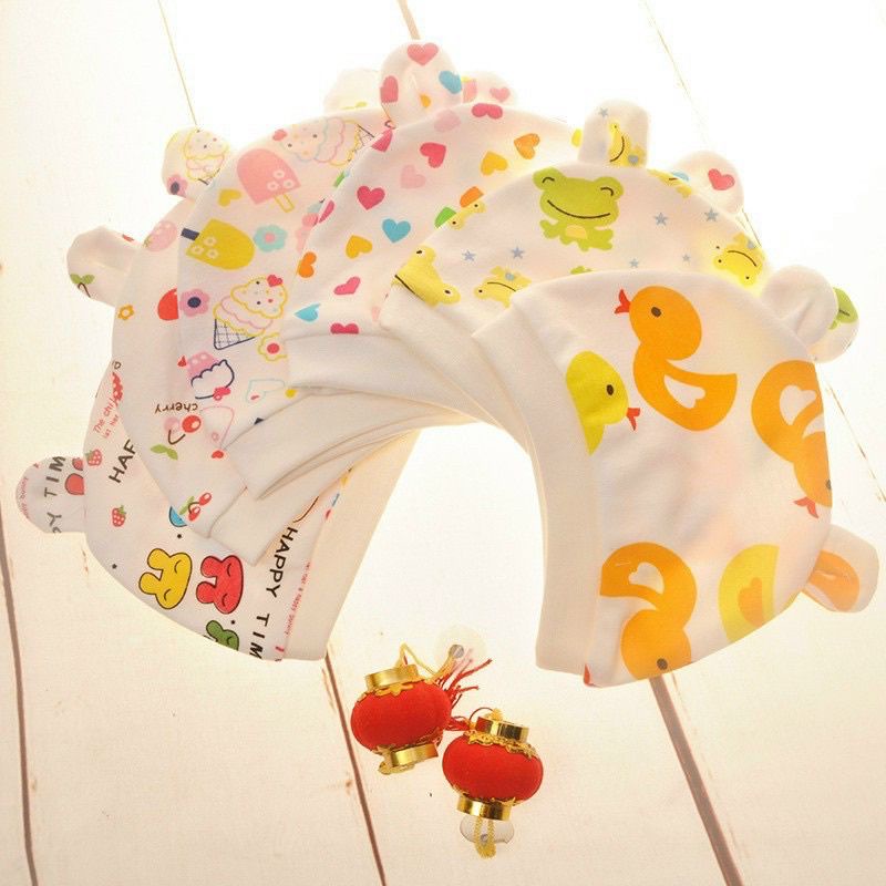 Mũ cotton sơ sinh màu trắng in hoạ tiết cho bé