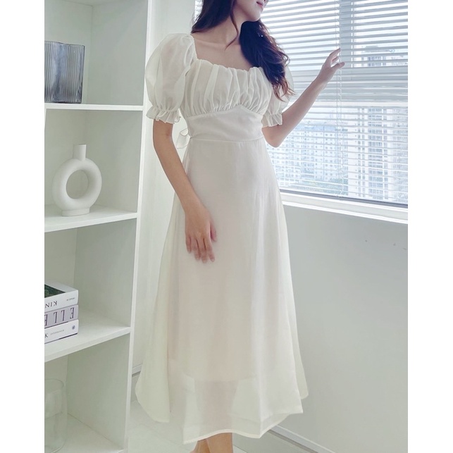 Đầm trắng xoè đi tiệc nhúng ngực nơ sau thun vai xuongvnxk