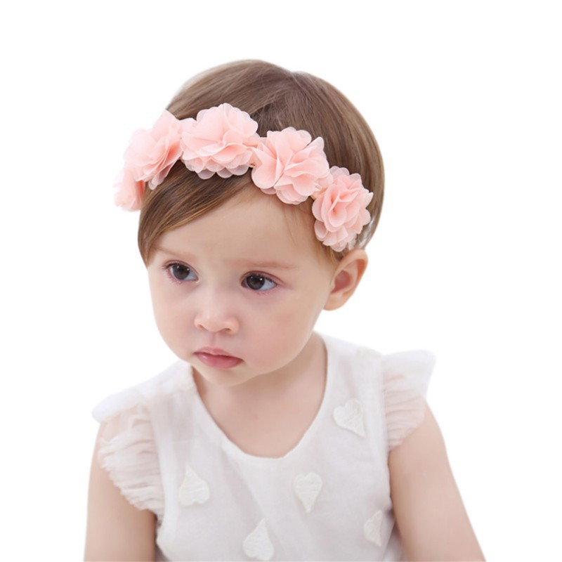 Băng đô gài tóc hoa xinh xắn dễ chịu cho bé gái