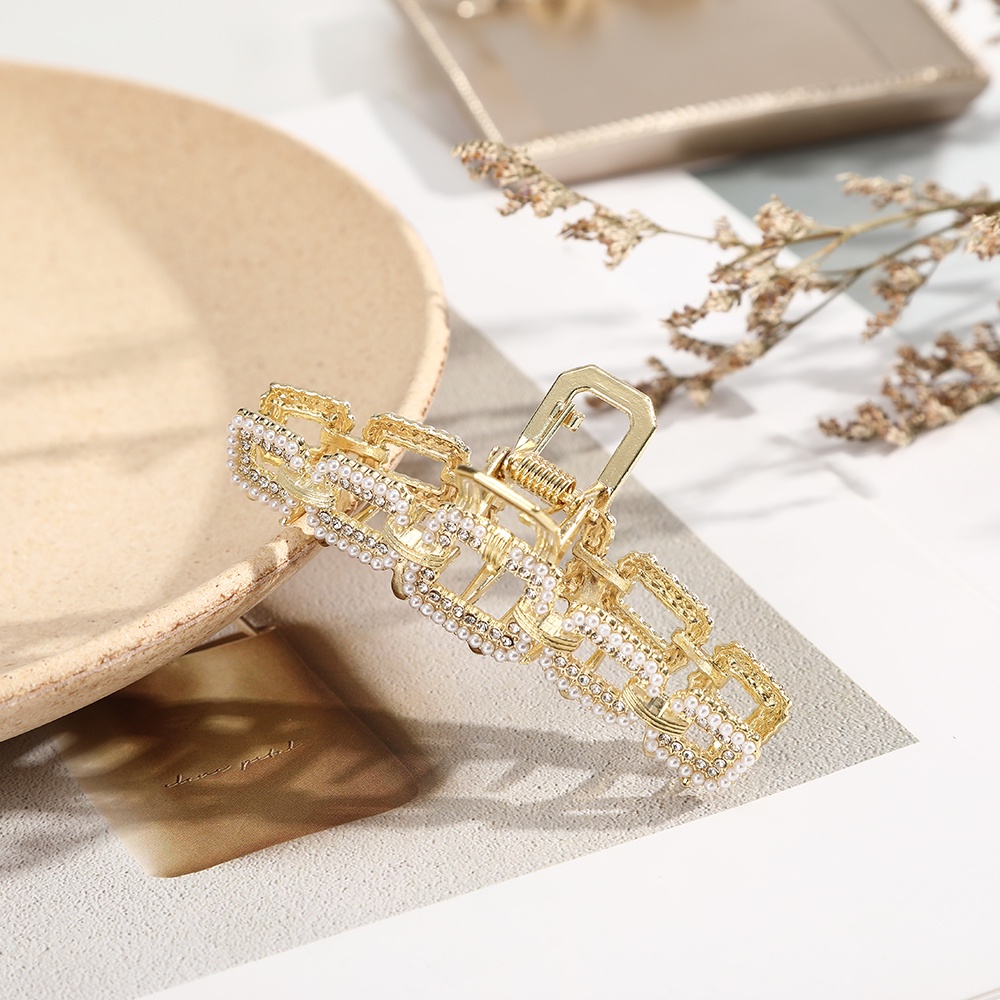 Kẹp tóc kim loại đính đá lấp lánh