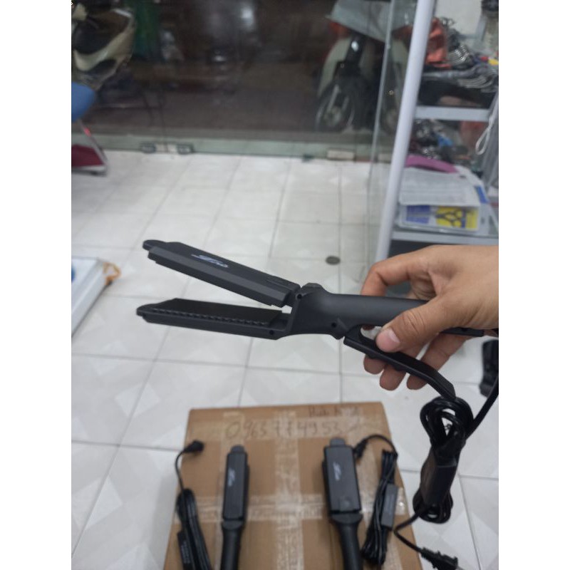 Máy là Bản Kìm