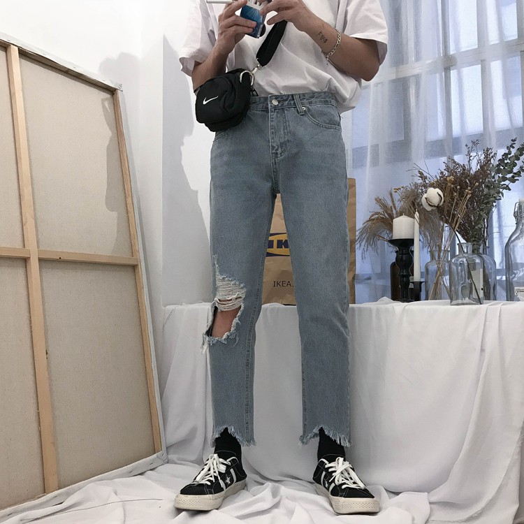 Quần Baggy Jean rách gối - Gấu lệch tua rua