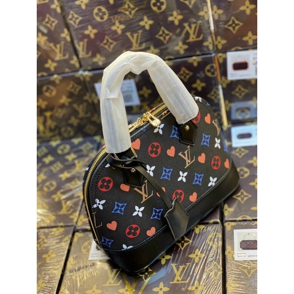 Túi xách nữ dáng hến hoa văn LV