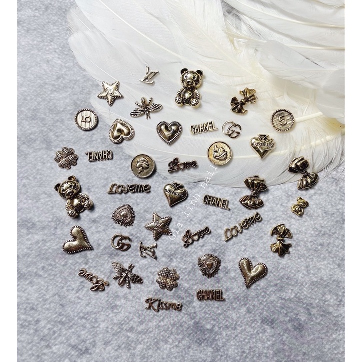 Charm set gấu nơ ( y hình )