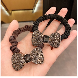 cột tóc mặt đính đá