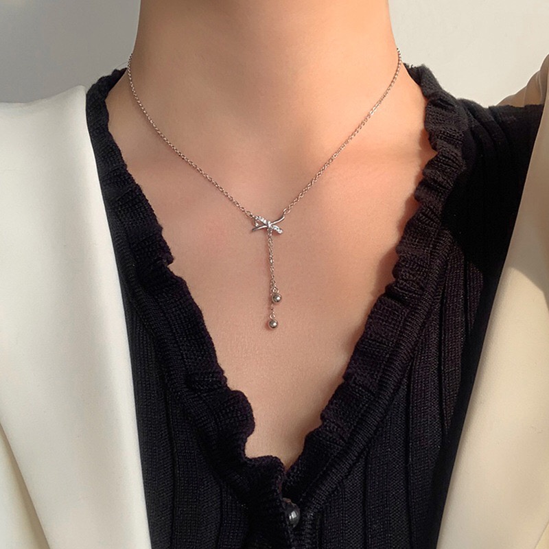 Dây Chuyền Nơ Đính Đá 2 Tua Rua Bi - Vani Store - TS000637