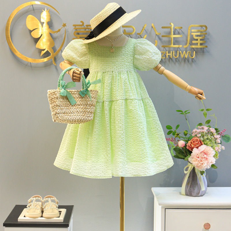 Váy bé gái xanh cốm 2 tầng nơ lưng XHN1016